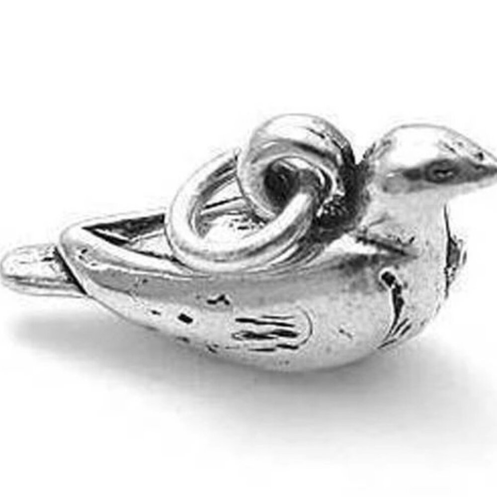 DOVE CHARM IN 3D STERLING SILVER